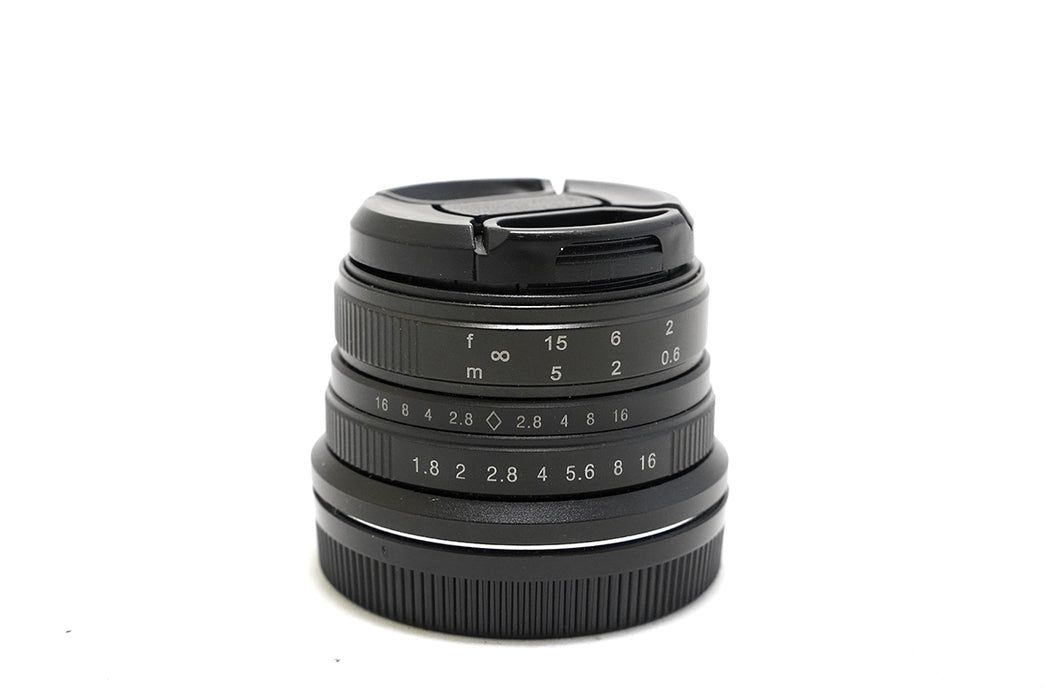 Obiettivo manuale Neewer per Canon Eos M 25mm f1.8 - bellissimo, con sacchetto in cuoio