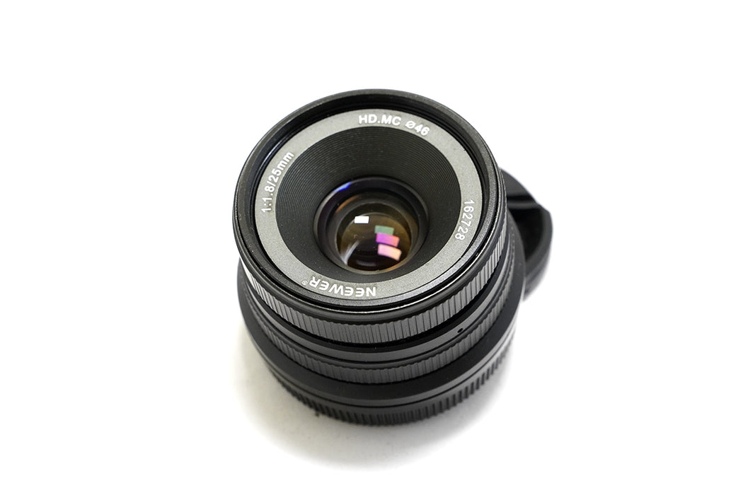 Obiettivo manuale Neewer per Canon Eos M 25mm f1.8 - bellissimo, con sacchetto in cuoio