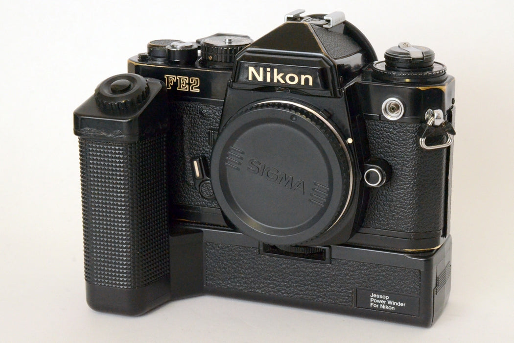 Nikon FE2 FE 2 Nera con Motore Jessop Esposimetro e Autoscatto non funzionano